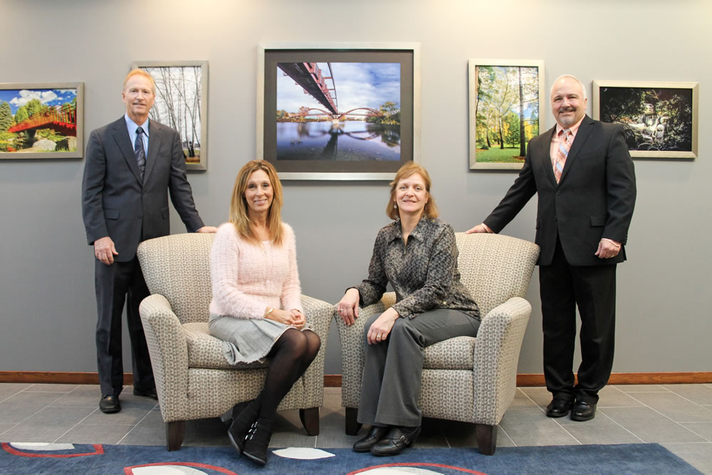 Founders Mark and Bruce and their wives - My Financial Coach